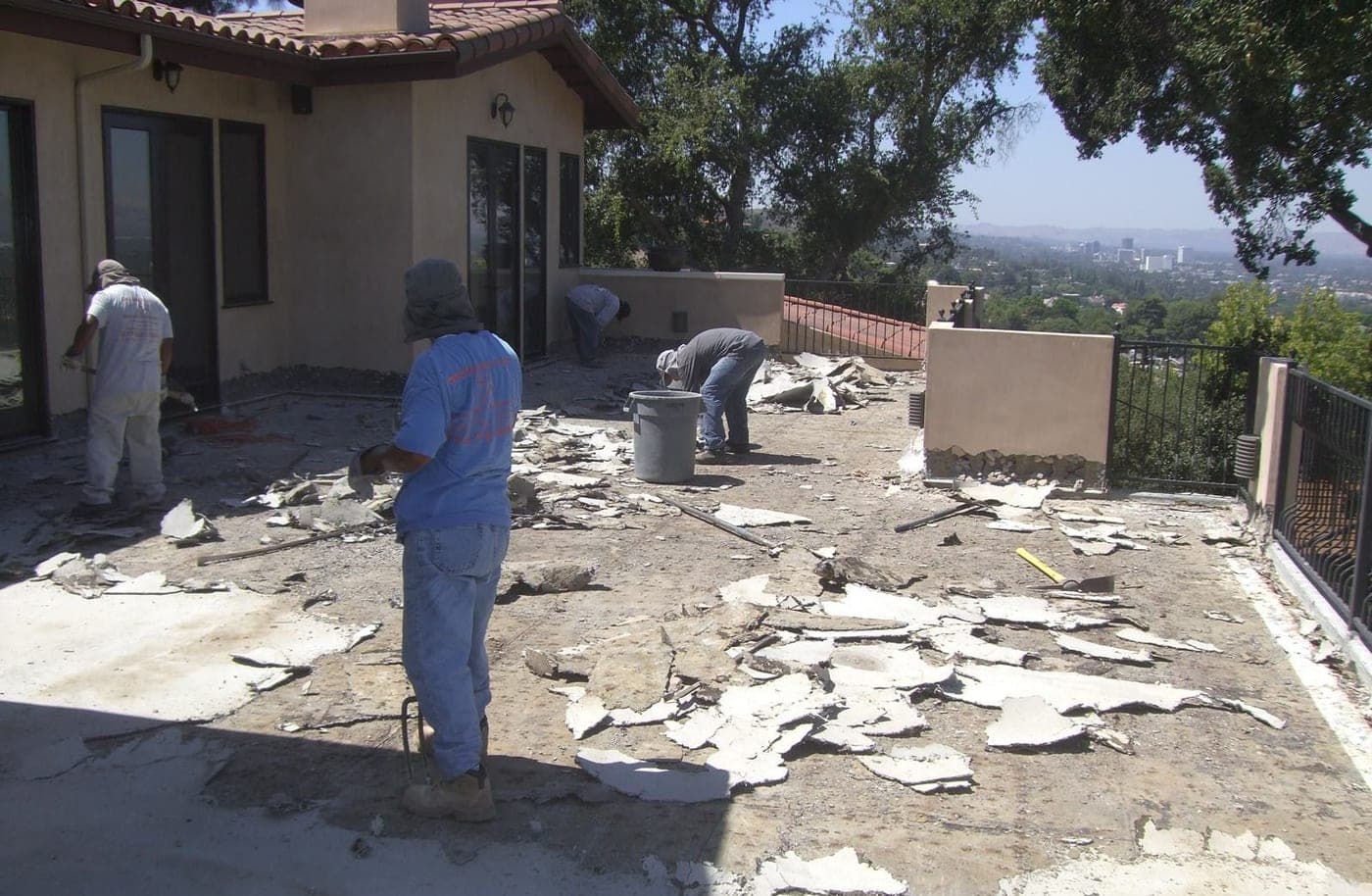 Old floor tile being removed from the Studio City rooftop deck