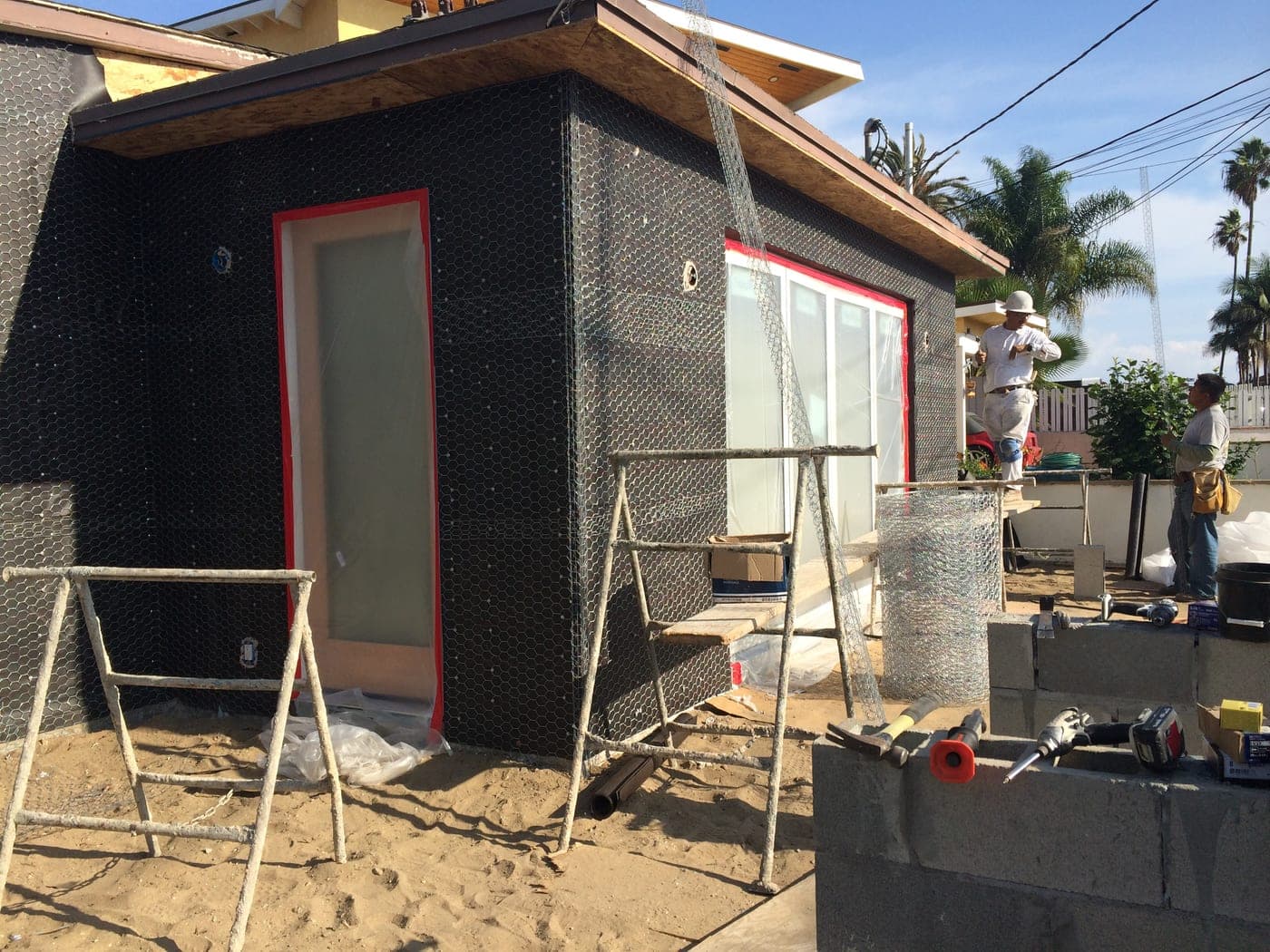 The Playa del Rey home re-wrapped with building paper and wire lath, ready for its new stucco